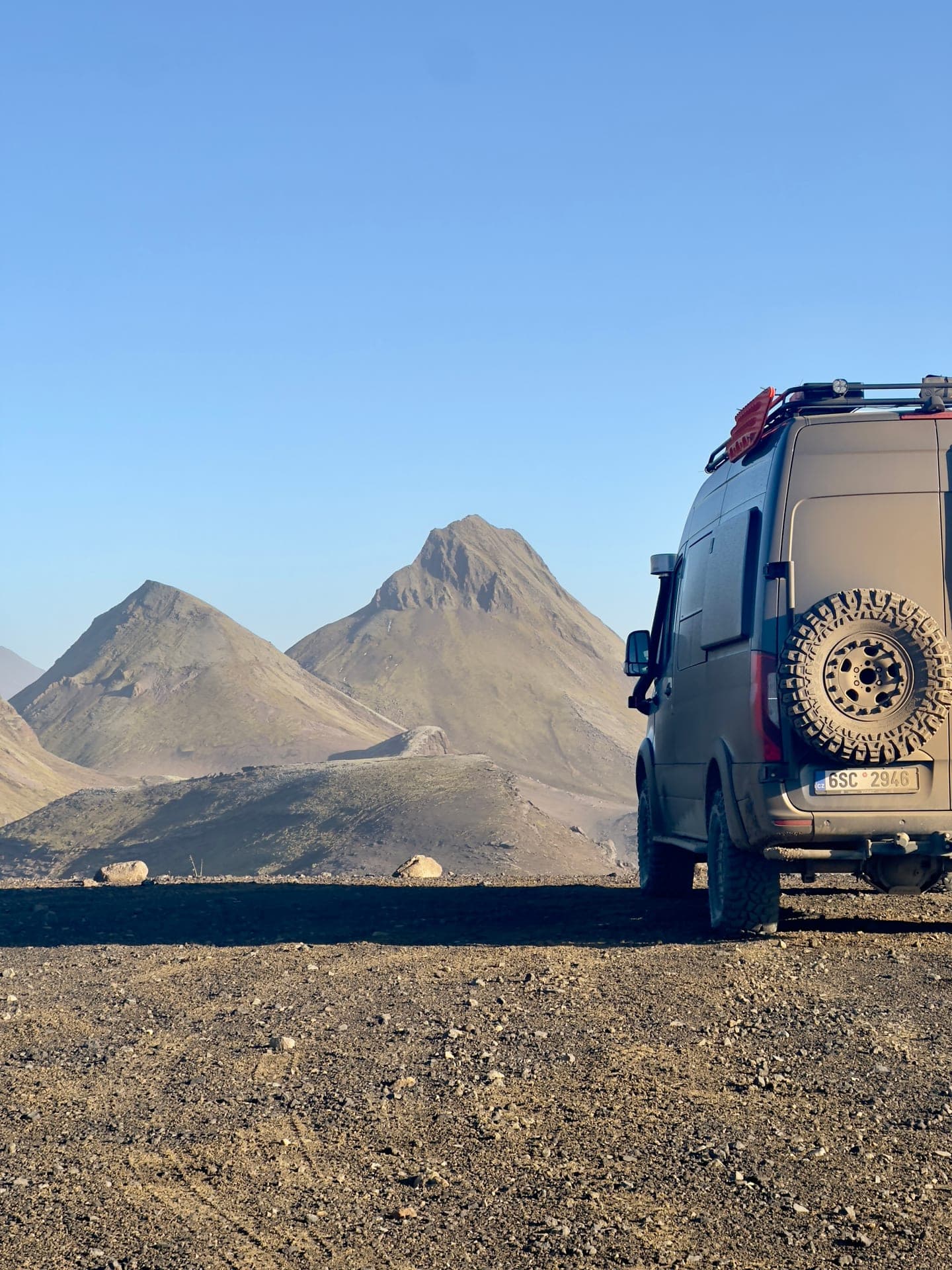 Mercedes Sprinter against a desert mountain pass