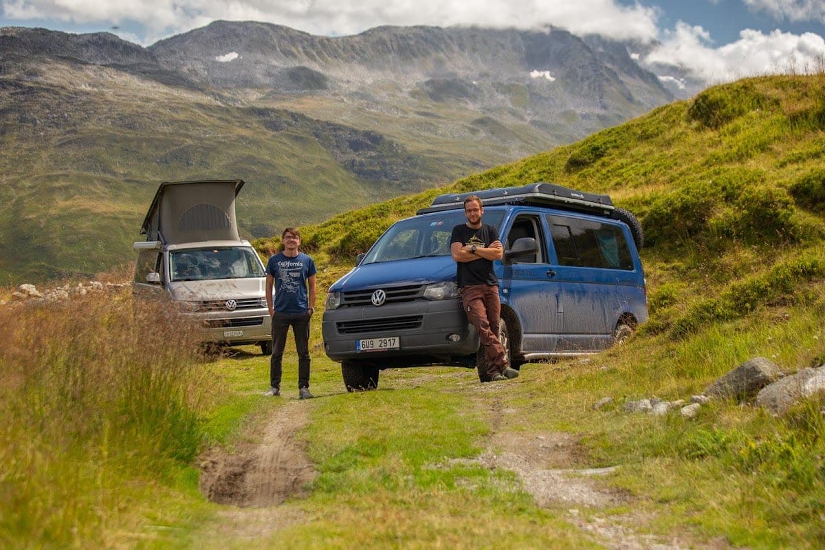 Jiří and Honzík with their VW campervans in the mountains